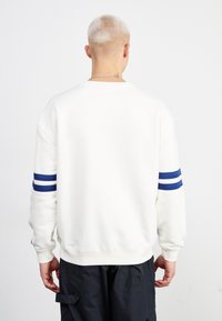 Ellesse MATIANO - Sudadera - off-white/navy