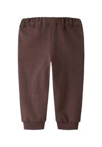 Brune joggerbukser i bomuldsblanding med elastisk talje og manchetter ved anklerne, der har en blød tekstur og glat finish.