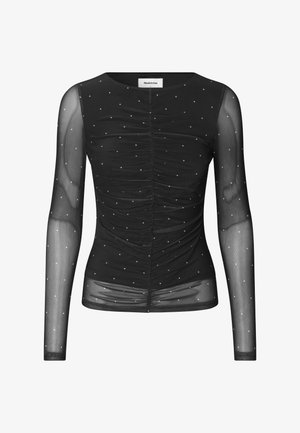 Zwarte lange mouwen top, doorzichtige stof met verzamelde details, versierd met kleine witte stippen, ronde halslijn, getailleerd ontwerp.