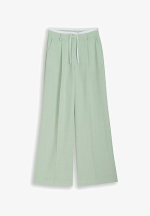 Light green wide-leg trousers with front pleats, side pockets, belt loops, and a white drawstring at the waist.