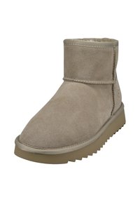 Beige Wildleder-Stiefelette mit runder Zehenform, weicher Innenauskleidung und einer strukturierten Gummisohle mit Zickzackmuster.