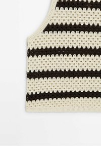 Virkkattu bralette, jossa on vuorotellen vaalean kerma ja tummanruskea raita. Neliskanttinen avonainen kudontasuunnittelu ja saumatonta reunaa, luoden tekstuurisen ilmeen.