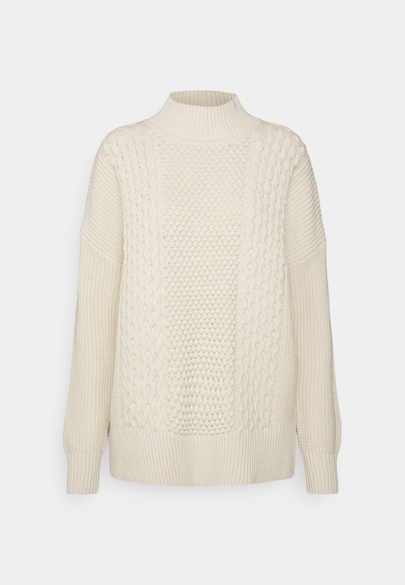 Maglione a maglia color crema con colletto alto, caratterizzato da pannelli testurizzati e maniche con polsini a coste. Tessuto morbido e spesso con una vestibilità comoda.