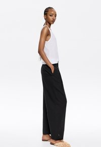 Bimba Y Lola Auduma bikses - black