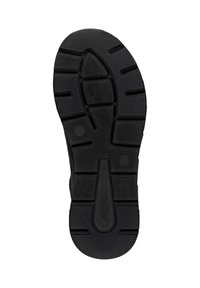 Black rubber shoe sole with a textured surface, featuring geometric patterns and grooves for grip. Logo detail is embossed on the side.