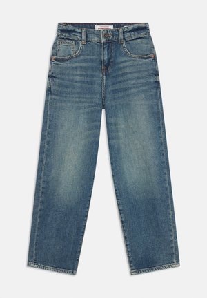 Heledad sinine teksapüksid, millel on kõrge vöökoht ja laiad sääred. Ees on taskud, vöökohaga aasad ja peen hajumine. Õmblused kontrastsetes värvides.