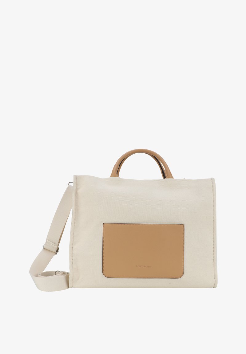 Beige lærredstaske med et glat tan læderaccent og top håndtag. Har en aftagelig skulderrem og en frontlomme.