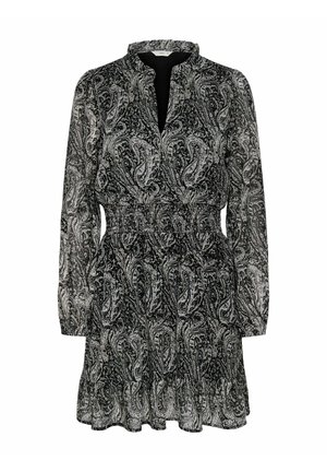 Robe à manches longues à motif paisley noir et blanc, taille élastique et ourlet volanté, sans col avec une petite ouverture en V.