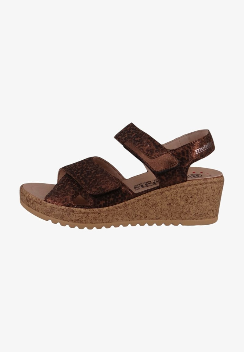 Braune Leopard-Print Wedge-Sandale mit zwei verstellbaren Klettverschlüssen, Korktextur-Mittelsohle und strukturiertem Gummiaußensohlen für Stabilität.