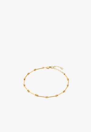 Bransoletka w odcieniu złota z cylindrycznymi i pierścieniowymi ogniwami, wyposażona w zapięcie typu lobster oraz regulowane przedłużenie łańcuszka.