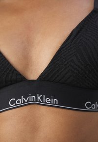 Calvin Klein Underwear LIGHTLY LINED TRIANGLE - Reggiseno a triangolo - black