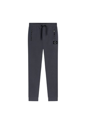 Grå joggebukser med snor i taljen, lynlåslommer på siden, tætsiddende cuffs og et sort lappe-logo på venstre ben. Blødt, komfortabelt stof.
