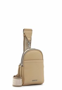 Beige leather crossbody bag with silver zipper, front pocket, textured strap, and brand logo. Compact design with durable materials.