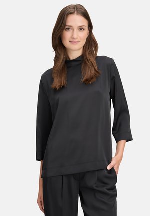 Bluse - schwarz