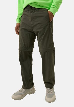 Khaki joggerbroek gemaakt van lichtgewicht stof, met een elastische tailleband, ritszakken en een taps toelopend ontwerp.