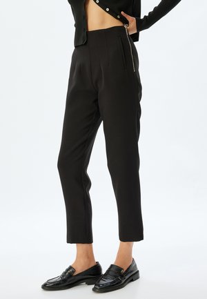 CIGARETTE - Pantaloni - black