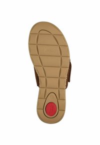 Bruin sandaalzool met getextureerd tan rubber, voorzien van een rode cirkelvormige accenten en groeven voor grip. Maat gemarkeerd als 37.