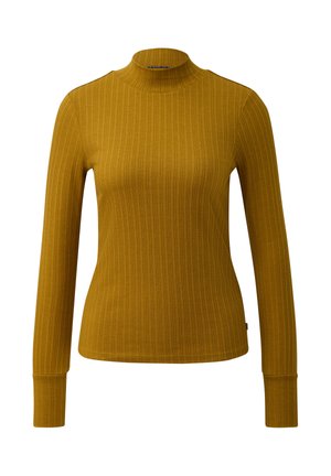 Geribbelde coltrui in mosterdgeel. Lange mouwen, tapered vorm en zachte textuur. Heeft een hoge kraag en subtiele branding aan de zoom.