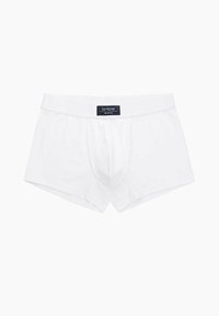 Boxer-briefs en coton blanc avec une coupe ajustée, une taille élastique arborant une étiquette de logo et une poche contournée pour le soutien.