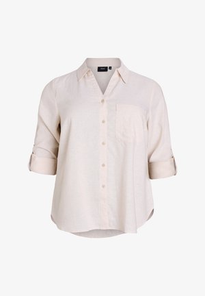 Light beige button-up shirt with a v-neck, rolled-up sleeves, a chest pocket, and a relaxed fit. Made from a soft, textured fabric.