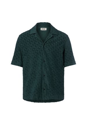 Short-sleeve shirt in dark green with textured geometric pattern, button front, and collar. Fabric appears soft and plush.