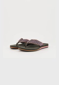 Black flip-flops featuring a geometric patterned fabric strap in purple and pink, with a textured footbed and a multi-colored sole edge.