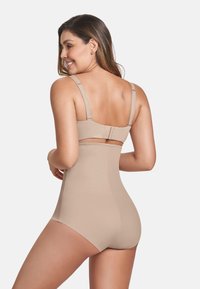 Beige Mieder-Kleidungsstück mit verstellbaren Trägern und einem Haken- und Ösenverschluss auf der Rückseite, aus einem glatten, dehnbaren Stoff für Komfort.