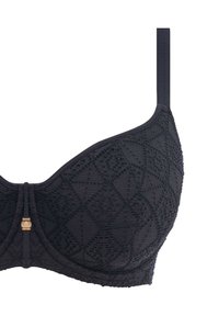 Reggiseno nero realizzato in tessuto testurizzato con motivi geometrici, leggero lucido e un'accento decorativo dorato al centro davanti. Spalline regolabili.