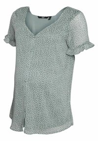 Grün gemusterte Bluse mit kleinen weißen Punkten, kurzen, gerafften Ärmeln, V-Ausschnitt und Knopfleiste vorne, aus leichtem Stoff.