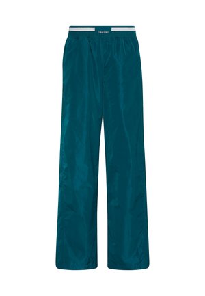 Turkooise lichte broek met een gladde textuur, een elastische tailleband met een logo, en een losse pasvorm voor comfort en bewegingsvrijheid.