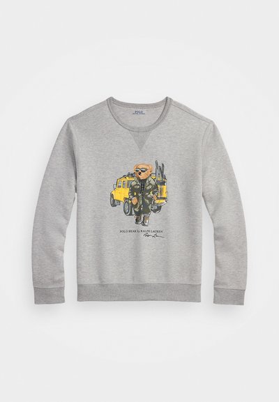 Gray sweatshirt with crew neckline, featuring a colorful graphic of a bear in military attire and a yellow vehicle. Soft fabric, ribbed cuffs.