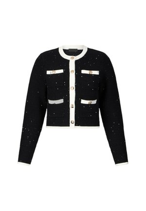 Cardigan nero corto con accenti bianchi, caratterizzato da una trama testurizzata, quattro tasche frontali con chiusura a bottone e dettagli decorativi con perline.