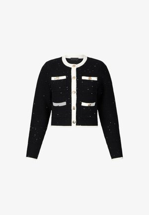Cardigan nero corto con accenti bianchi, caratterizzato da una trama testurizzata, quattro tasche frontali con chiusura a bottone e dettagli decorativi con perline.
