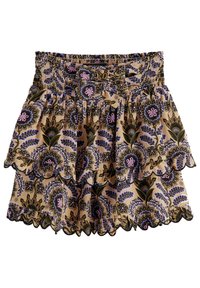 Blomstret nederdel med smocket talje, flæse-lag og en cremefarvet baggrund med lilla og grønne mønstre. Udsmykket med bølget kant.