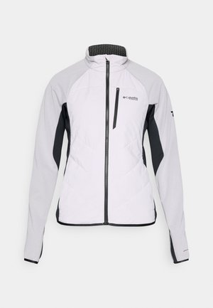 White jacket with gray and black sleeves, padded front, high collar, zip closure, and subtle textured patterns on sleeves. Columbia logo displayed.
