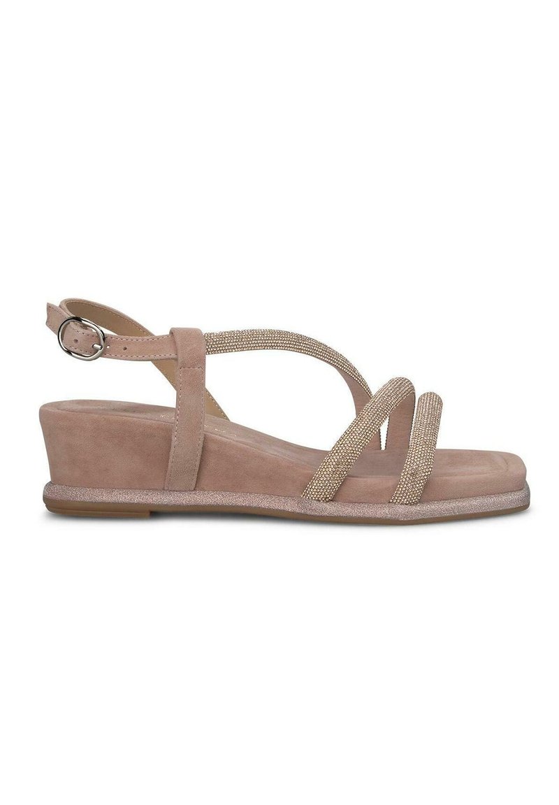 Sandalo a zeppa in morbido suede rosa pallido con cinturini incrociati in glitter e fibbia regolabile alla caviglia. Suola in gomma plana per stabilità.