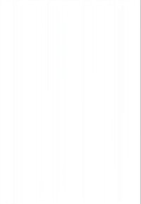 Bruinharige man met een blauwe jas zit op een witte bank en typt op een zwarte laptop in een minimalistische kantoorruimte.