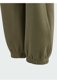 adidas Performance FUTURE ICON - Pantalones deportivos - olive strata   black