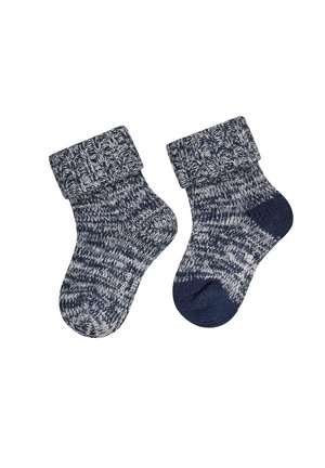 Pair of navy blue and white knit baby socks with folded cuffs and textured pattern on a white background.