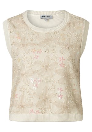 Haut en maille sans manches crème avec une grande superposition de dentelle florale beige et des paillettes discrètes éparses, col rond, bords côtelés.