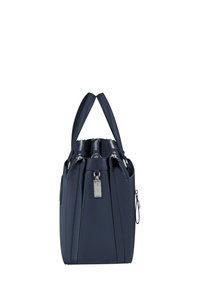 Navy handbag featuring smooth material, dual top handles, zippered closure, and a rectangular shape with a silver hardware tag.