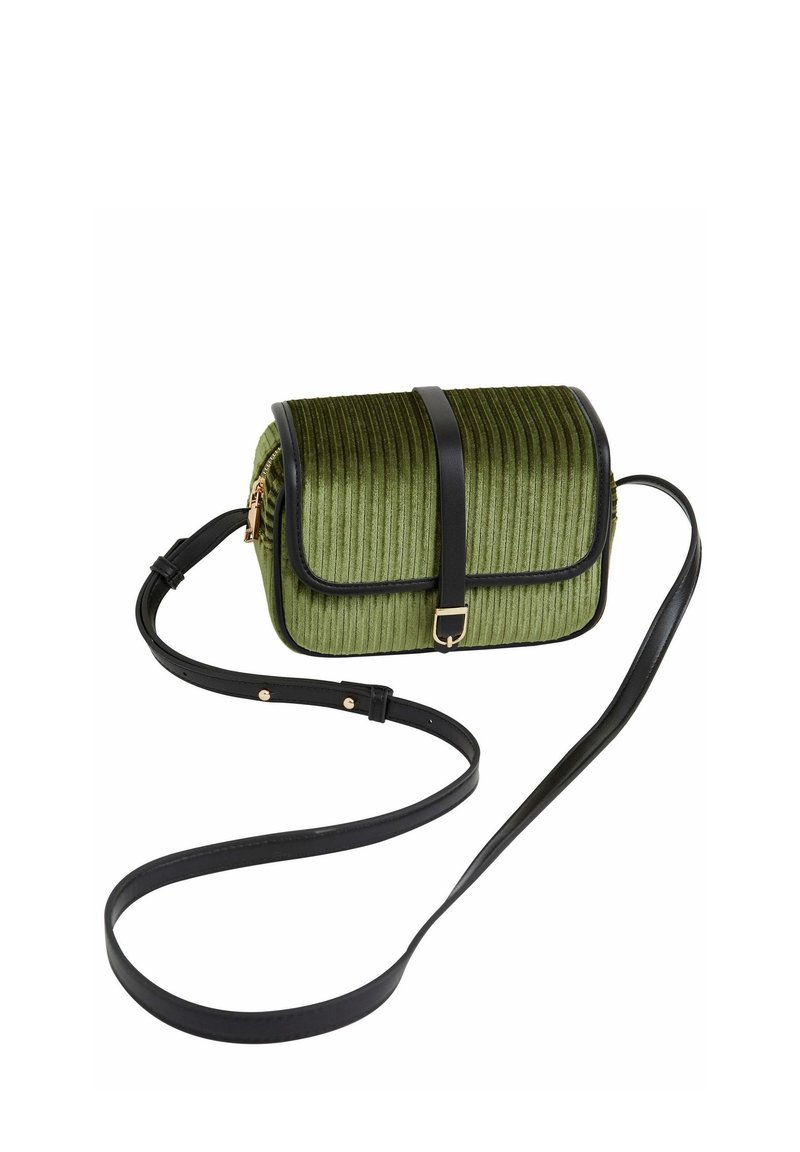 Green ribbed fabric crossbody bag with a black leather strap and trim. Features a front flap with a gold-tone buckle and zipper closure.