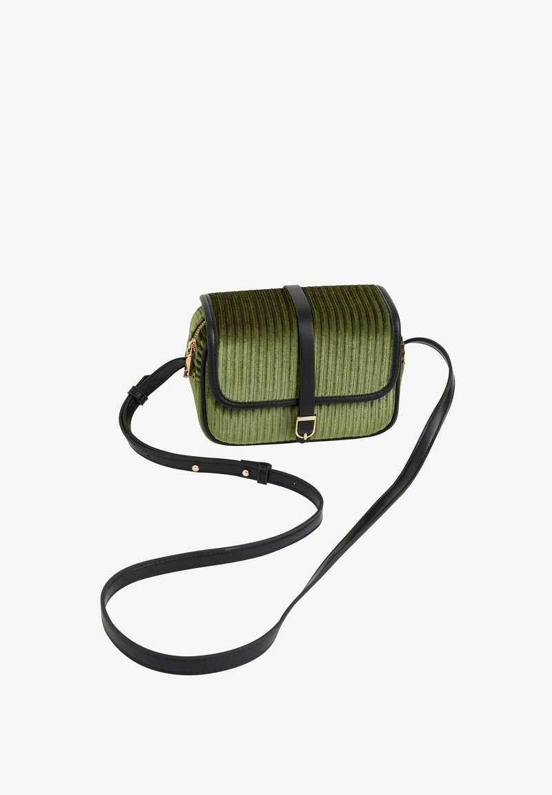Green ribbed fabric crossbody bag with a black leather strap and trim. Features a front flap with a gold-tone buckle and zipper closure.