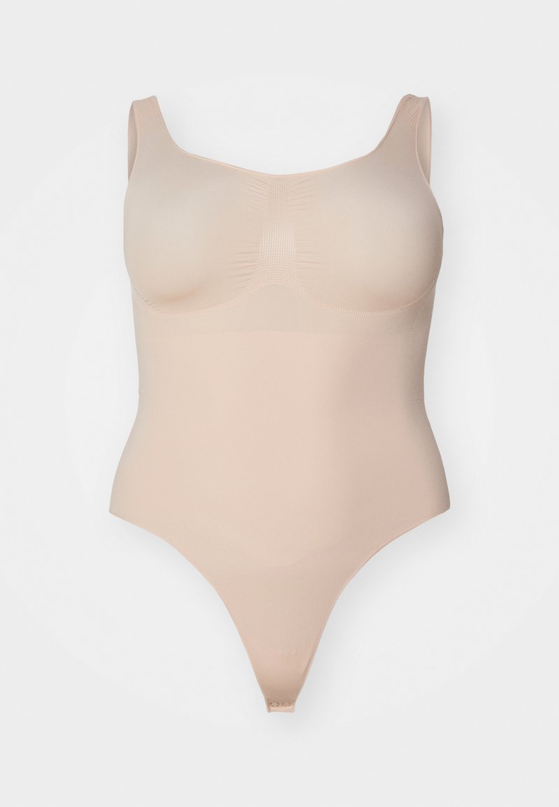 Nackter Einteiler mit dünnen Trägern, nahtlosem Design, enganliegender Form und einem Tanga-Rücken. Hergestellt aus glattem, dehnbarem Material.