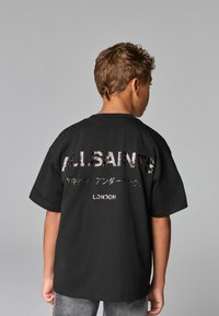 smALLSAINTS REGULAR FIT - CREW  - Tričko s potlačou - black leopard