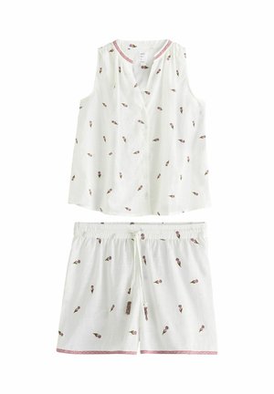 Fehér ujjatlan felső és rövidnadrág szett, apró rózsaszín virágmintával, rózsaszín szegéllyel a nyakkivágáson és a rövidnadrág alján, valamint húzózsinóros derékpánttal a rövidnadrágon.