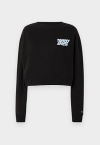 Černý zkrácený svetr se známým kulatým výstřihem, na hrudi s světle modrým logem "TOMMY JEANS" a textem "NEW YORK CITY".