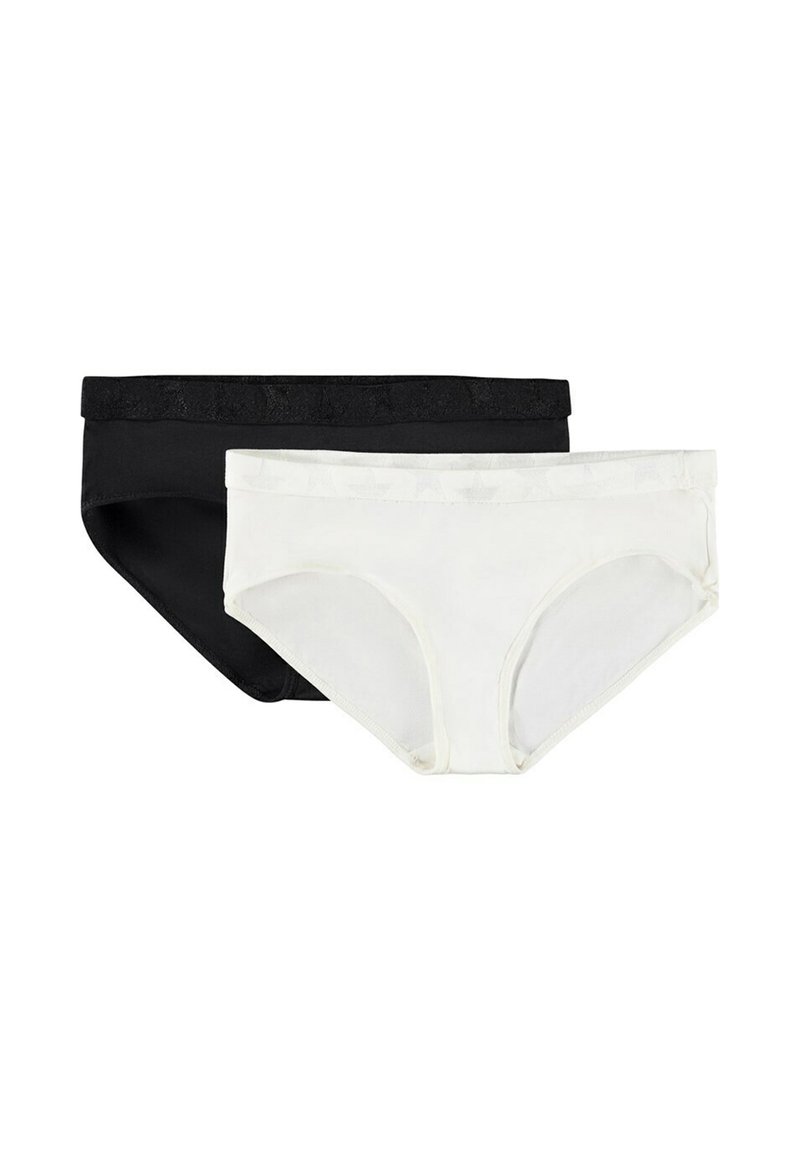 Zwart-witte katoenen slips met een brede, gestructureerde tailleband met sterrenpatronen. De zwarte slip is aan de linkerkant, de witte aan de rechterkant.