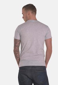 Paradiso Clothing GRATEFUL DEAD STEAL YOUR FACE - Print T-shirt - mottled light grey/light blue/light red