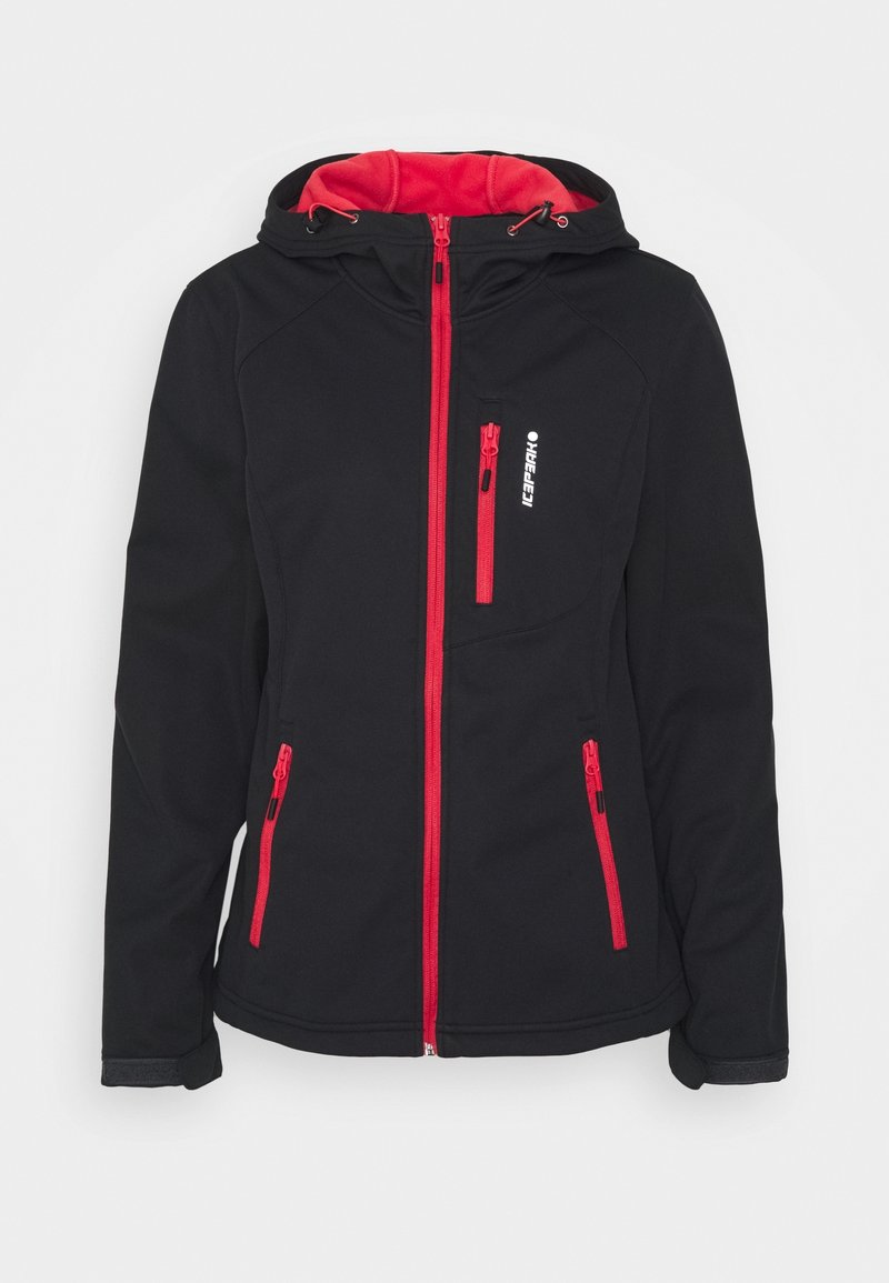 Veste softshell noire avec fermetures éclair rouges, capuche réglable, poches poitrine et latérales, avec une doublure intérieure rouge contrastante.